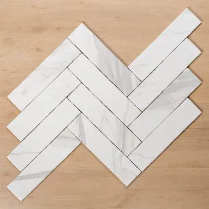 Perisher White Marble Gloss Cushioned Edge Ceramic Subway Tile 75x300mm by The Blue Space, a Marble Look Tiles for sale on Style Sourcebook