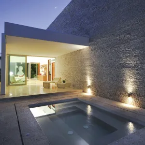 CLA Weatherproof Outdoor Up/Down Wall Spotlight in Cylindrical Design Stainless Steel by Compact Lamps Australia, a Wall Lighting for sale on Style Sourcebook