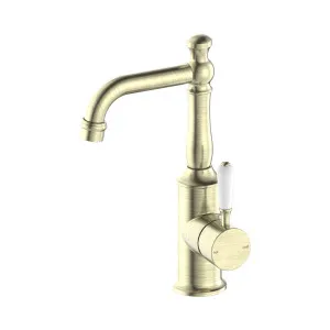 York Basin Mixer With White Porcelain Lever Aged Brass by NERO, a Bathroom Taps & Mixers for sale on Style Sourcebook