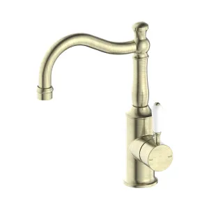 York Basin Mixer Hook Spout With White Porcelain Lever Aged Brass by NERO, a Bathroom Taps & Mixers for sale on Style Sourcebook