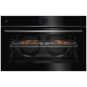 AEG 90cm 7000 Series Pyrolytic Built In Oven Gloss Black with Stainless Steel Trim NBS7A731VB by AEG, a Ovens for sale on Style Sourcebook